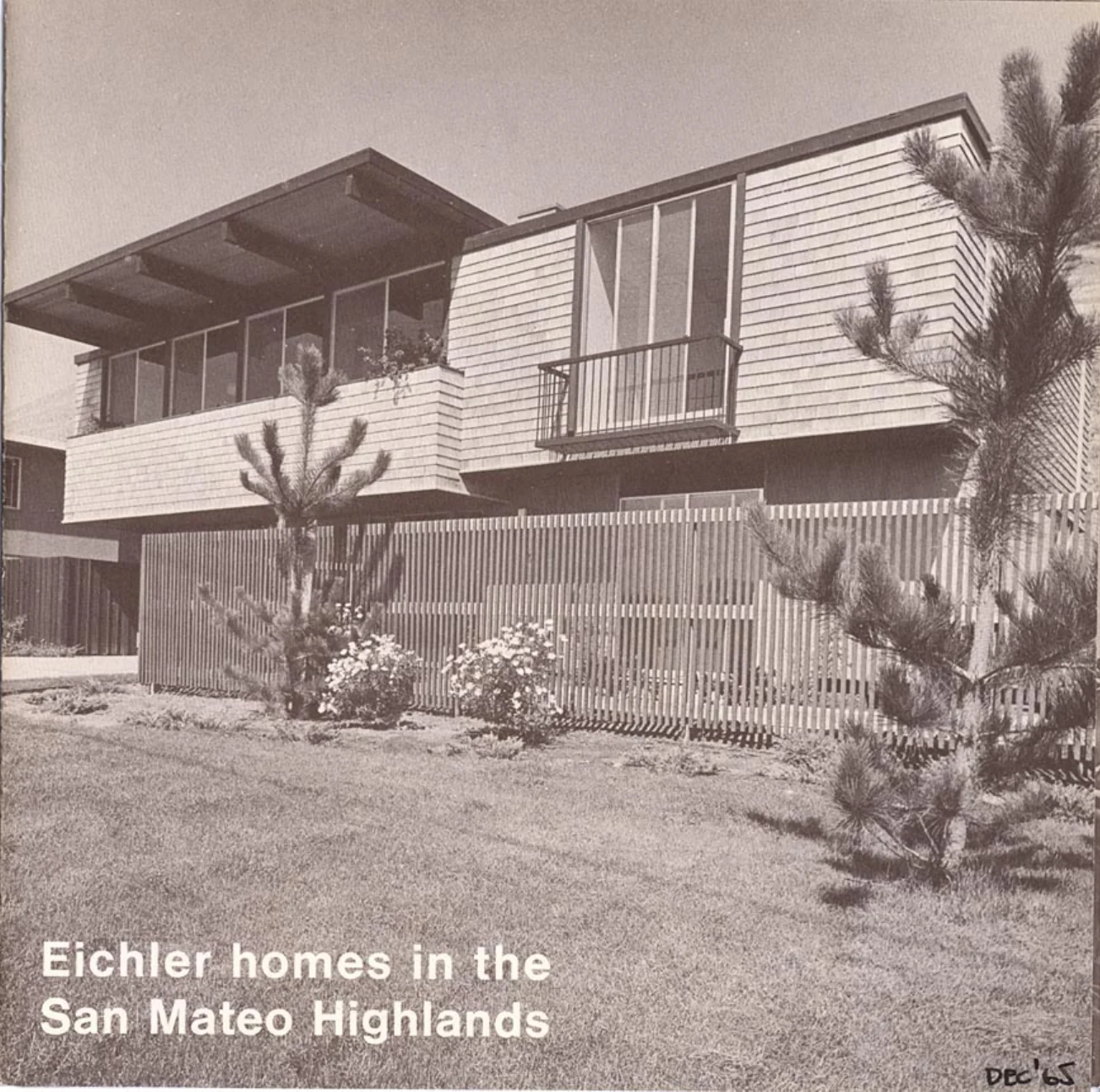 Brochure cover photograph of a two-storey Eichler with a shingled upper floor and a cantilevered balcony, captioned Eichler homes in the San Mateo Highlands.